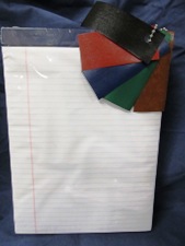 standard size paper pad, ruled white, choice of color tape top